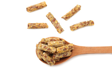 Granola breakfast in wooden spoon isolated on white background. muesli. healthy food. fitness food. top view