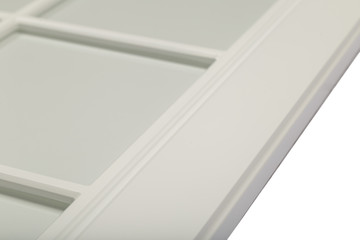 Detail close-up of a white frame facade for the kitchen.