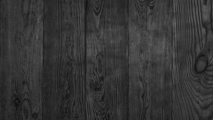 Black wooden texture. Top view. Copy space