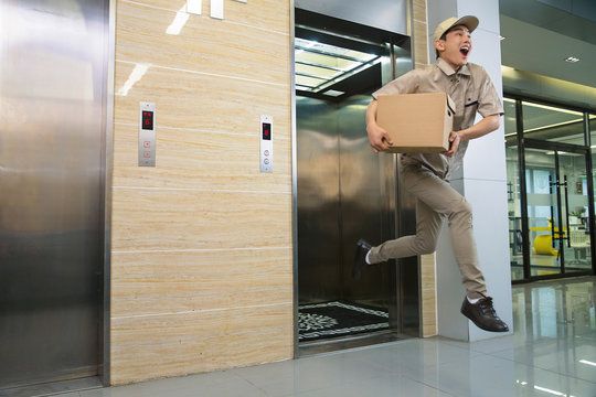 Male Courier with a parcel