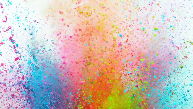 Super slowmotion shot of color powder explosion isolated on white background.