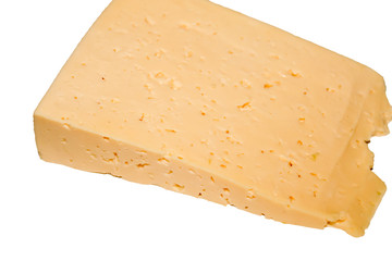 Piece of cheese isolated on white background