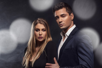 Conceptual portrait of an elegant couple.