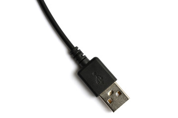 Black USB cable plug isolated on white background.