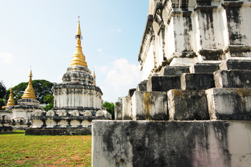 Golden pagoda at Wat Prathat Lampang Luang temple located in Lampang Province, Thailand.