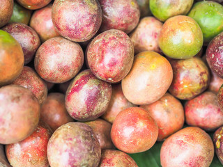 Closeup of passion fruits pattern in the market or super store.