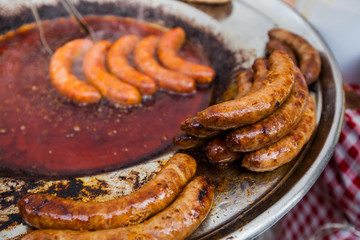 Fried pork sausage at gastronomy fair