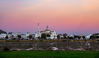 El Rocio village at dusk with pink sky