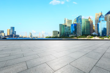 Empty square floor and financial district cityscape in Shanghai