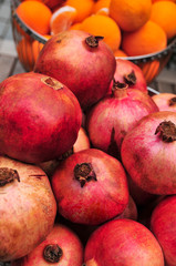 Ripe pomegranate fruit on wooden vintage background. 