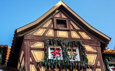 Traditional wooden house in Alsace with Christmas decorations