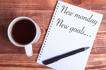 coffee pen inscription and notebook