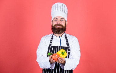 Chef man in hat. Secret taste recipe. Bearded man cook in kitchen, culinary. Vegetarian. Mature chef with beard. Dieting and organic food, vitamin. Healthy food cooking. Bite more