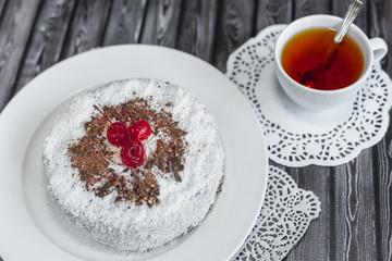 Bakery delicious food concept. Big tasty cake with nuts and cherry inside with cream 
