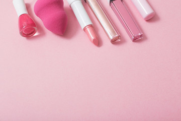 female pink cosmetics, top view