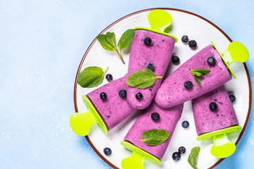 Blueberry ice cream popsicles top view.