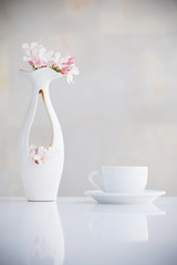 still life with flowers in white vase