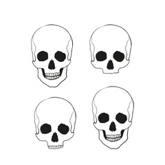 Icon set of isolated skulls in doodle style.