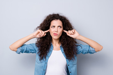 Close up photo amazing beautiful her she lady hands arms shut hide ears terrible pain ignore yelling screaming not listen wearing casual jeans denim shirt clothes outfit isolated grey background