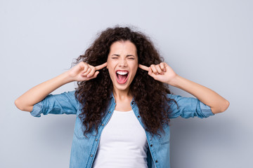 Close up photo yelling amazing beautiful her she lady arms shut hide ears terrible pain not listen ask begging please stop wearing casual jeans denim shirt clothes outfit isolated grey background