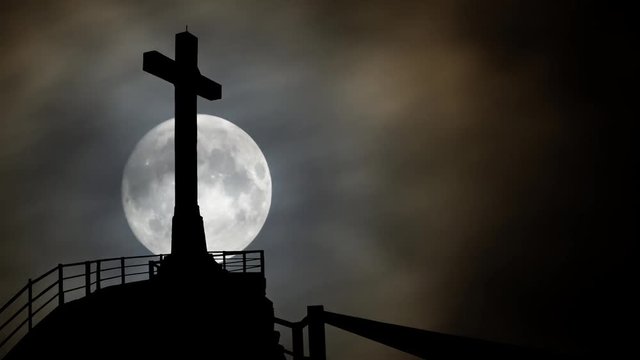 Monumental Cross on Top of Saint Catalina's Castle (Castillo de Santa Catalina) by Night with Full Moon, Spain