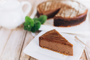 Chocolate cheese cake with mint. Photo for menu 