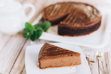 Chocolate cheese cake with mint. Photo for menu 