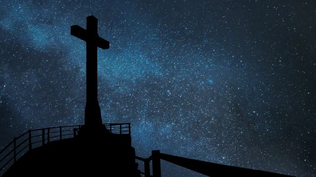 Monumental Cross on Top of Saint Catalina's Castle (Castillo de Santa Catalina) by Night with Stars and Milky Way in Background, Spain