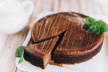 Chocolate cheese cake with mint. Photo for menu 