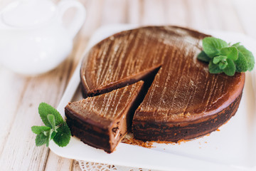 Chocolate cheese cake with mint. Photo for menu 