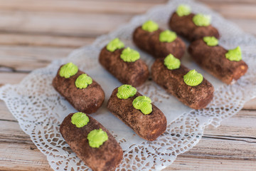 Baked sugar food dessert on wooden plate. Cookies and pastry