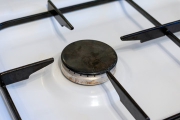 White Gas stove burners in kitchen room. Gas nozzle. No flame.