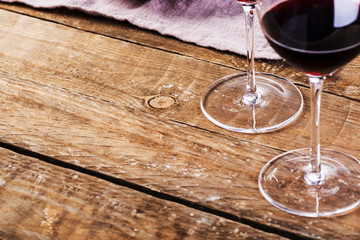 Closeup of red wine on wooden table