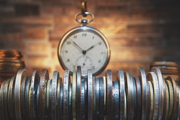 Time is money concept.Old coins and clock.Numismatics and collecting money.Russian Empire and world...
