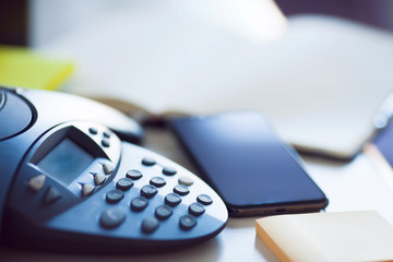 Ip telephony concept. Modern ip phones, sip terminals, conference phones and cameras for video...