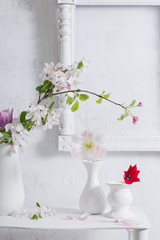 beautiful spring flowers on background white wall