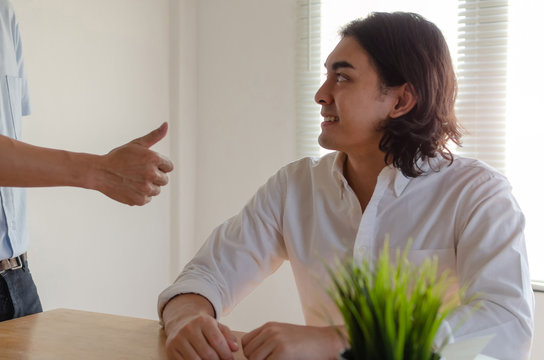 Good Job Man. Boss Team Leader Encourage And Showing Thumbs Up Expressing Positive Successful To Young Man Employee Smiling In Meeting Room At Home Office Company, Encouragement And Teamwork Concept