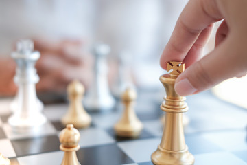 Businessman play with chess game. success management concept of business strategy and tactic challenge.