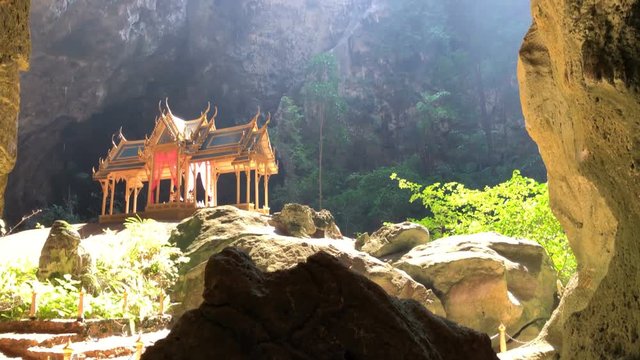 Amazing Phraya Nakhon cave in Khao Sam Roi Yot national park at Prachuap Khiri Khan Thailand is small temple in the sun rays in cave.