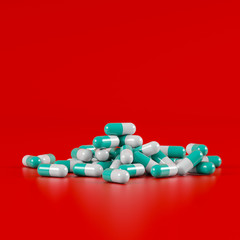 Different pharmaceutical medicine pills, tablets and capsules on red background. Health care concept. 3D render illustration.