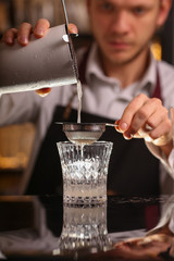 Barmen is making Fitzgerald cocktail
