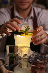 Barmen is making Fitzgerald cocktail