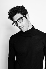 Handsome man in studio, looking to camera