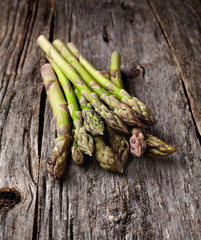 Asparagus on wooden background