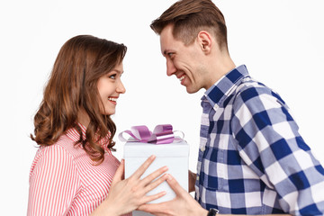 Happy couple with gift box