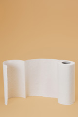roll of paper napkin on beige background