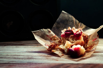 muffins on wooden board with dark background