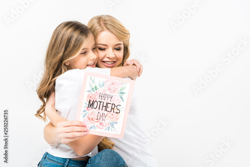beautiful woman with happy mothers day greeting card iembracing adorable daughter on white background