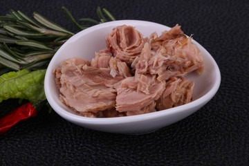 Tasty canned tuna fish in the bowl