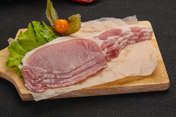 Raw pork bacon